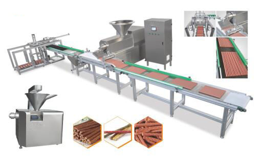 Το μασώντας σκυλί τσιμπά την κρύα μηχανή εξωθητών για τις λουρίδες κρέατος