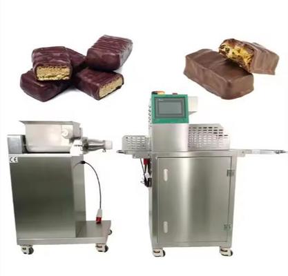 Πρησμένος φραγμός ρυζιού καραμελών/φραγμός σοκολάτας που κατασκευάζει τη μηχανή με τη διαμόρφωση και την κοπή